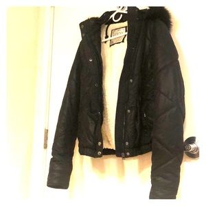 Black Lorna Jane Sherpa Lined Down Jacket.